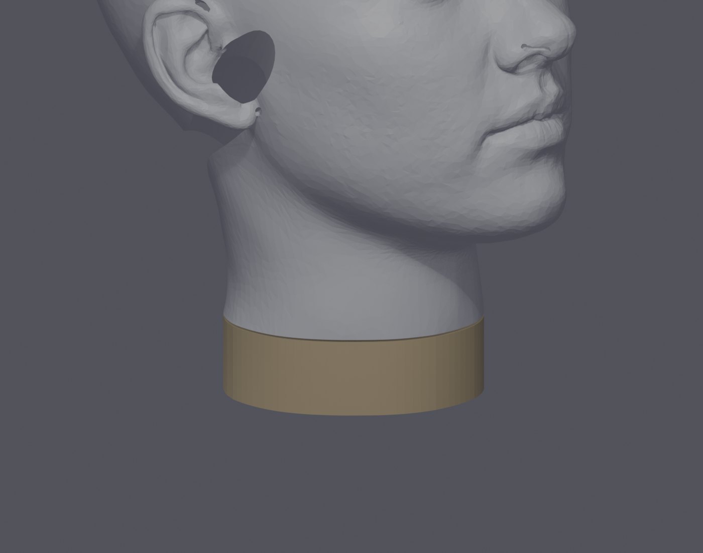 CAD render of the binaural head in profile, showing the ear and the neck joint to the torso